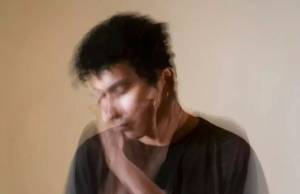 Blurred portrait of a man.
