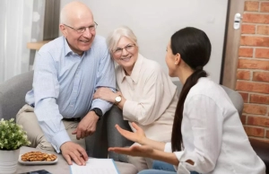 Senior couple consulting with a financial advisor.